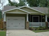 This new garage was added to the house, and the existing garage was converted to a den.